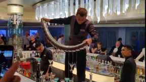 VIDEO: Martini Bar Bartender Pours 15 Martinis at Once on Celebrity Cruises