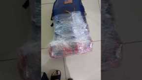 plastic wrap luggage