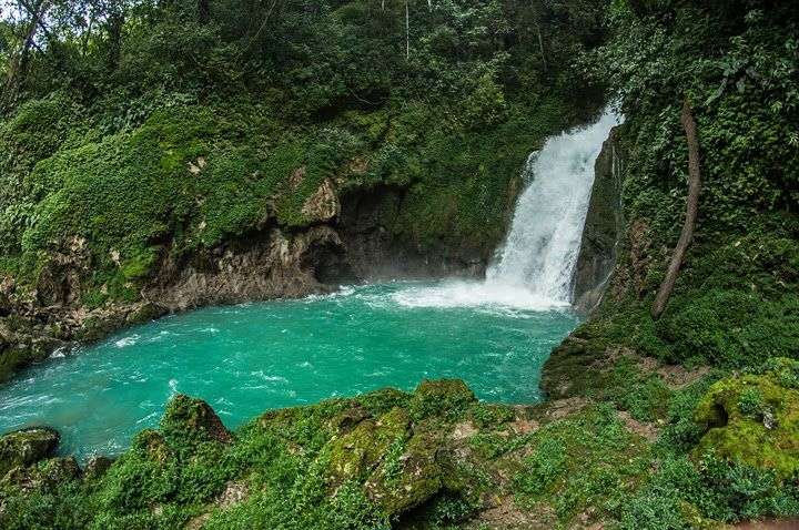 sachichaj waterfall and river in guatemala