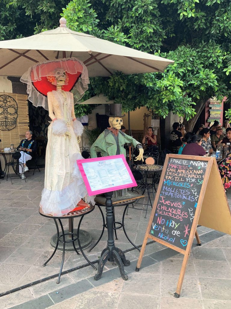 dolls outside a cafe in queretaro historic center