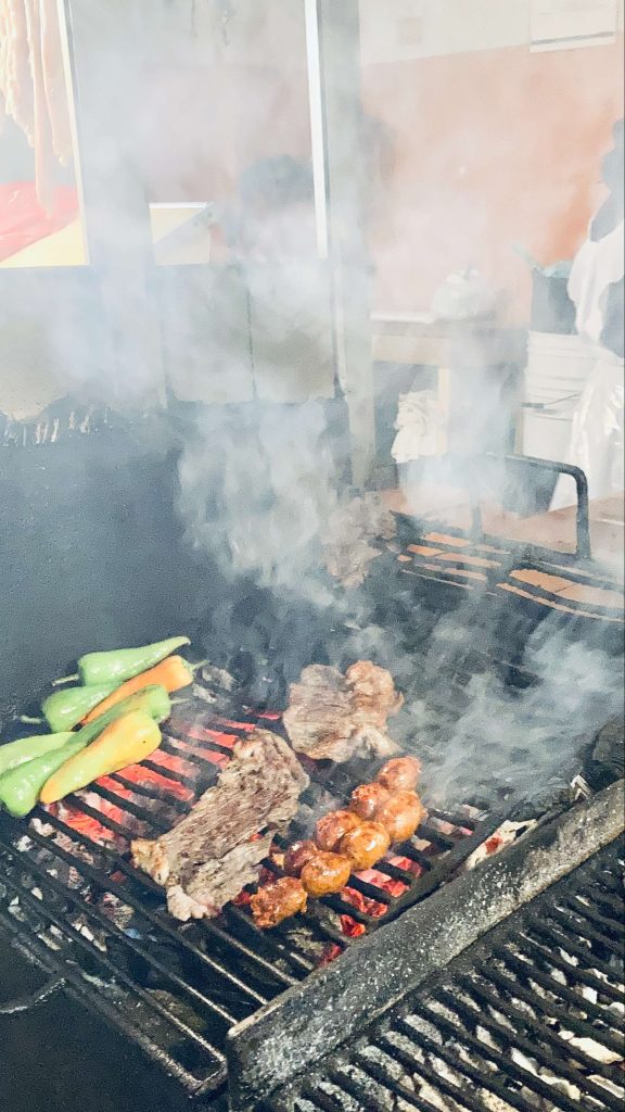 grilling oaxacan food in a market