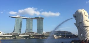 a water spraying out of Marina Bay Sands