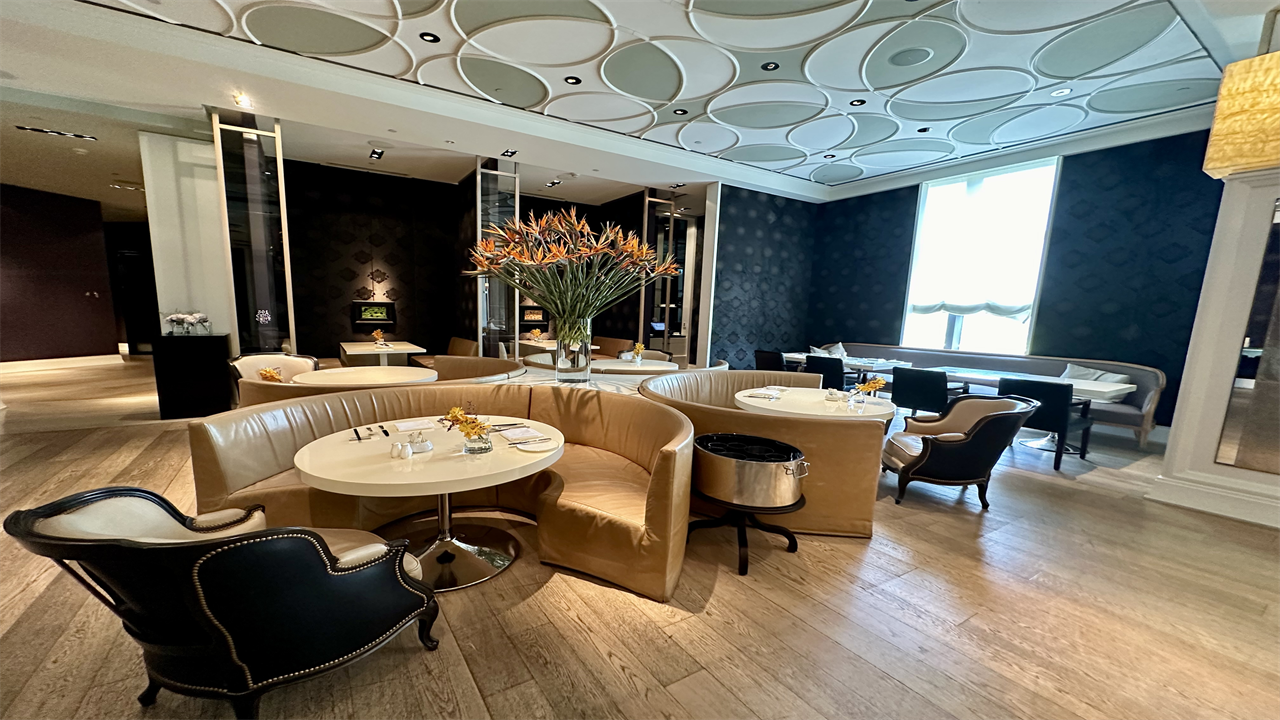 a room with tables and chairs at the Mandarin Oriental Taipei