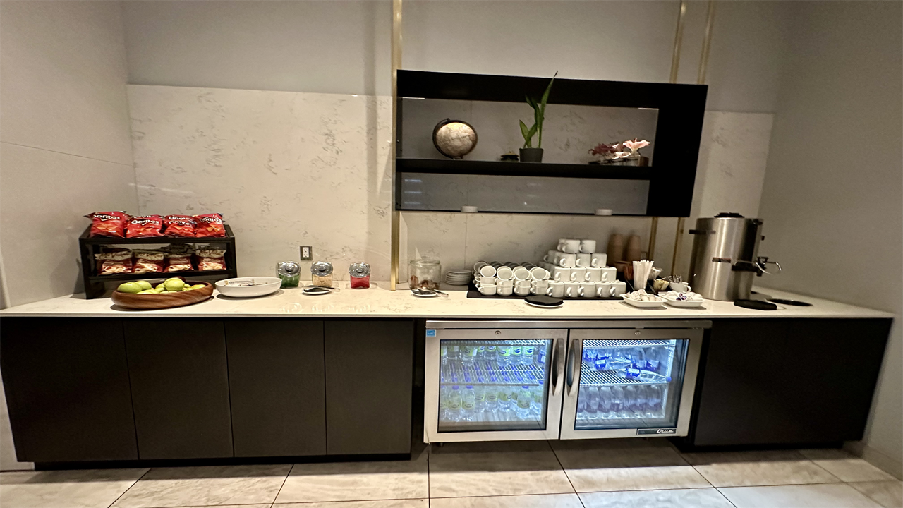 a kitchen with a fridge and a counter